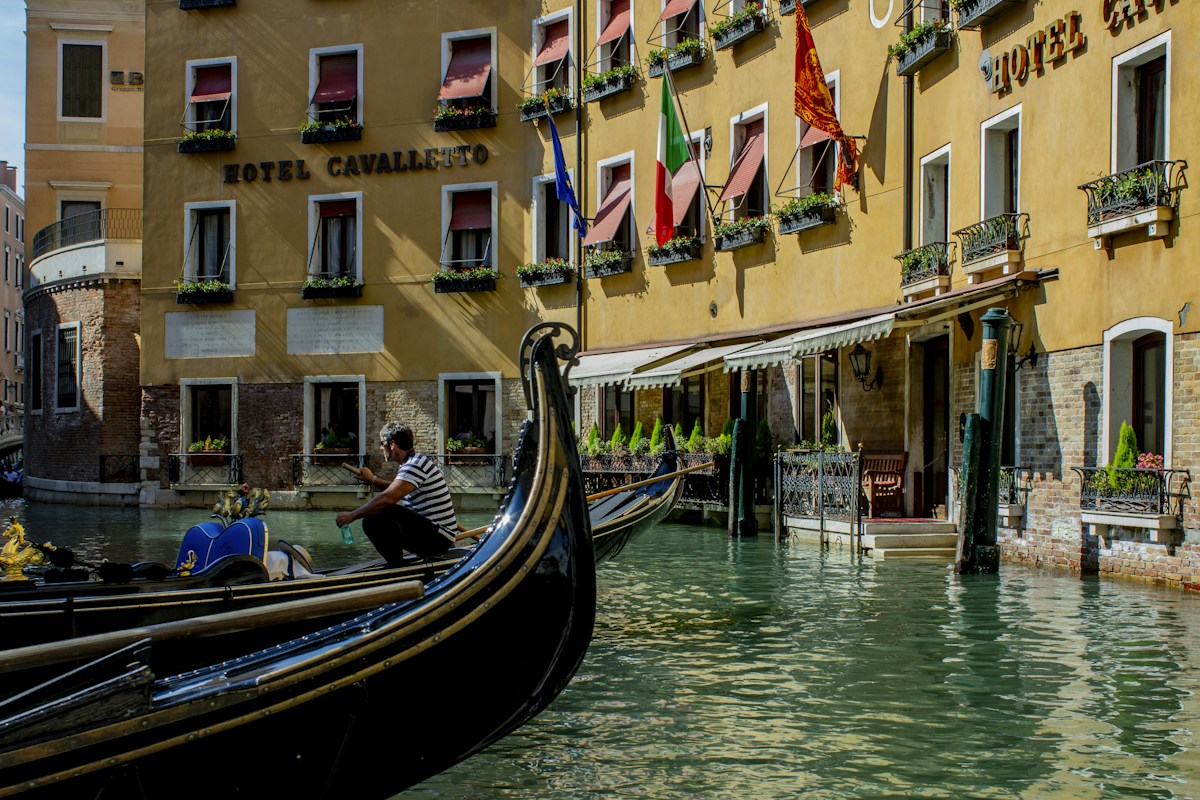 Gondolas moored on a Venice canal, a classic sight on 2 days in Venice