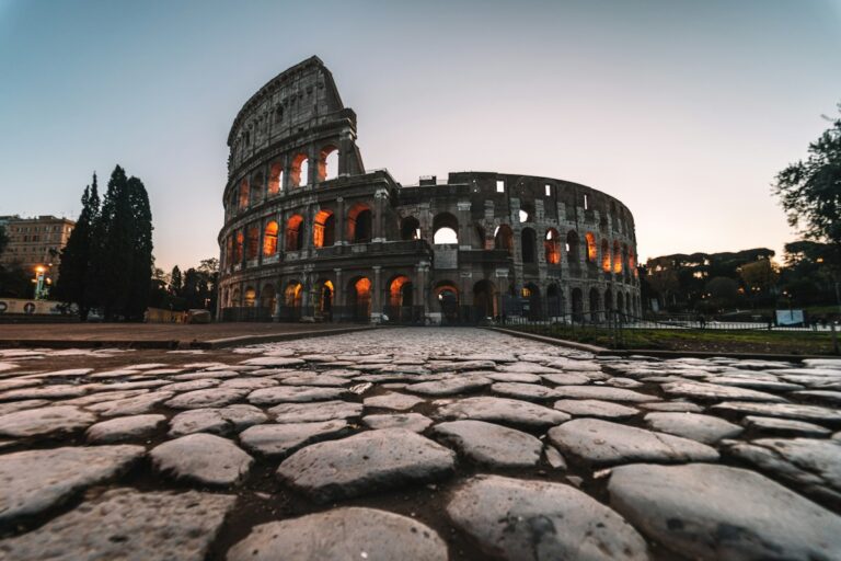 The Colosseum lit at dusk, the first stop in 3 days in Rome