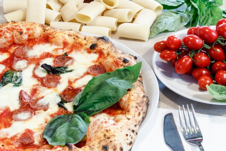 Best food tours in Naples: a Neapolitan pizza margherita fresh from the oven