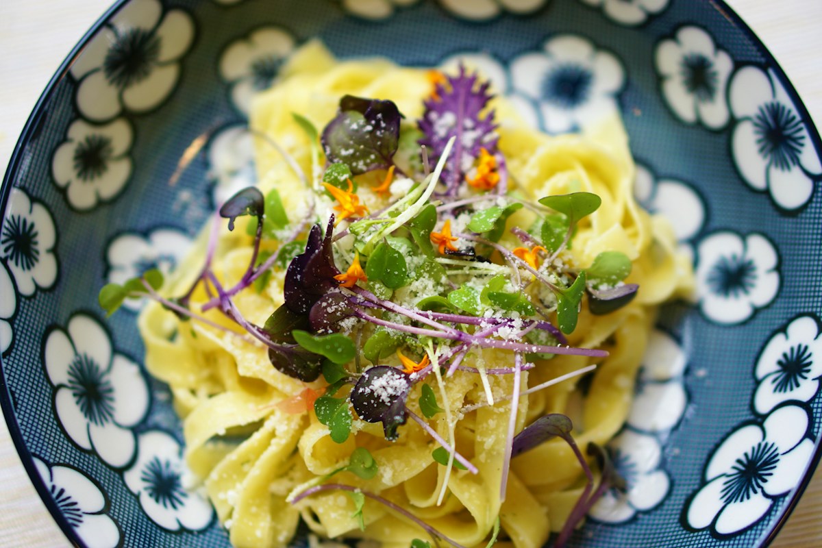 Fresh Italian pasta, a culinary illustration rather than a photograph of the Naples pizza class