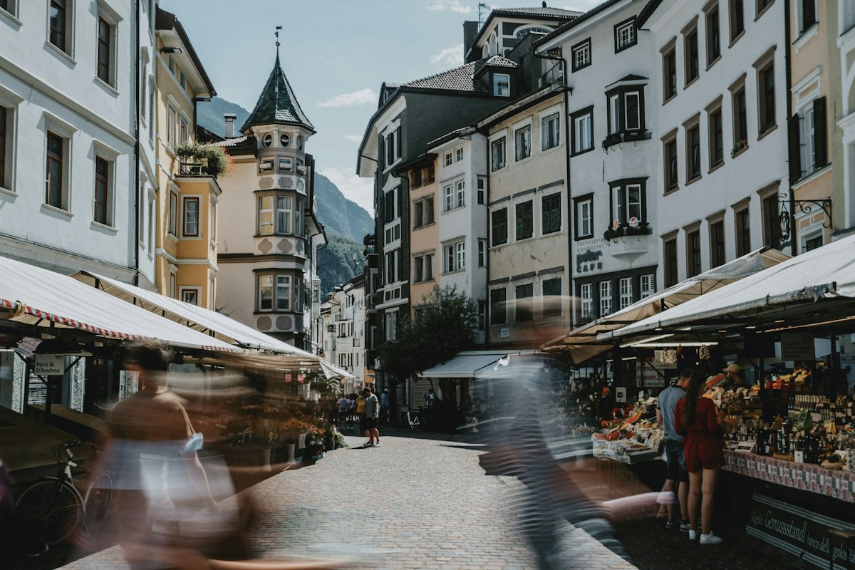 Bolzano Christmas market season: people walking through Bolzano old town