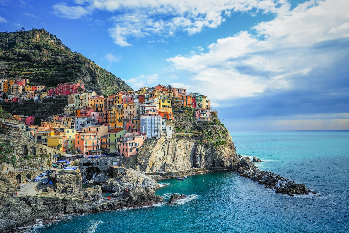 Colorful Cinque Terre village on rocks above the sea