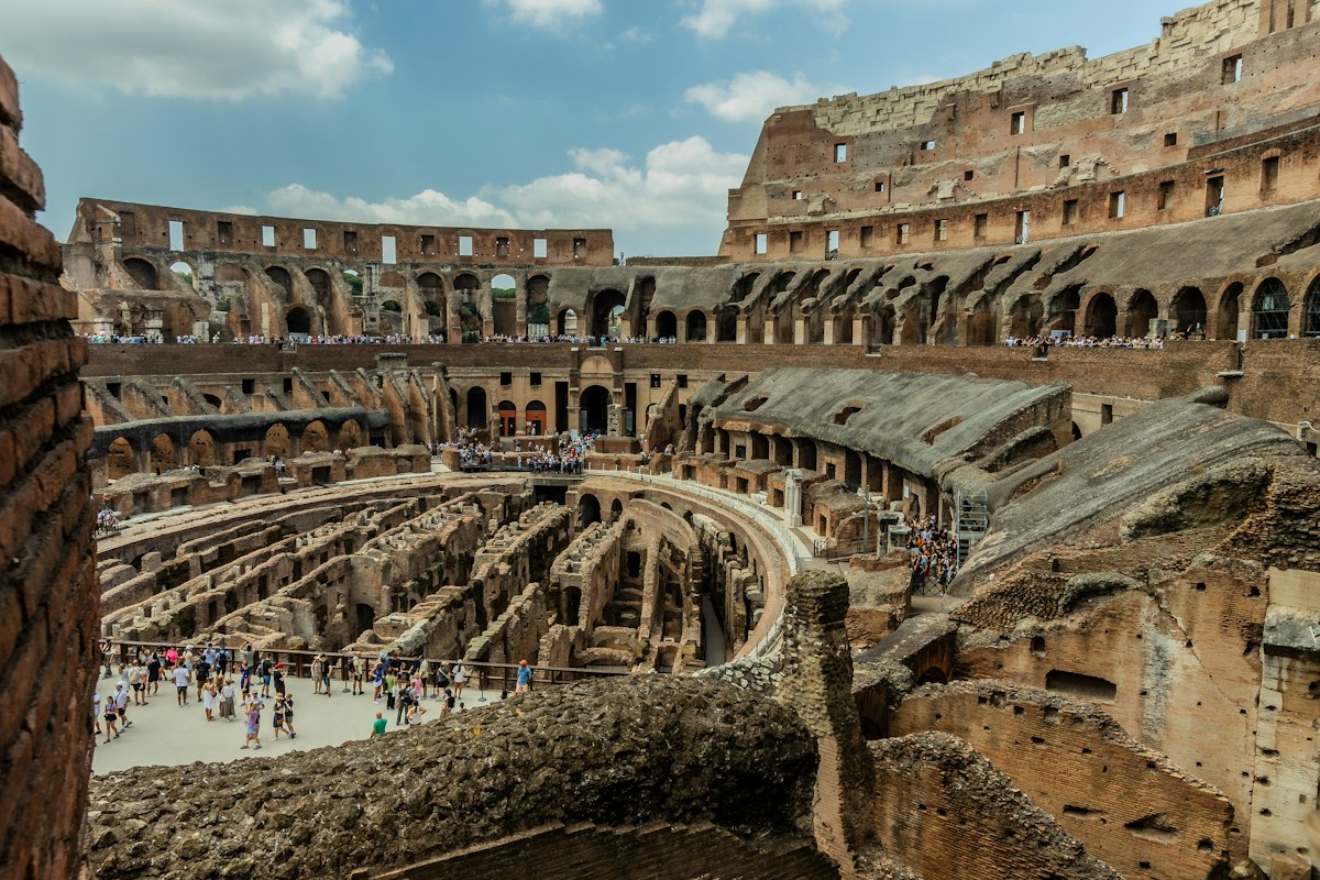 Colosseum underground tour: visitors inside the Colosseum in Rome