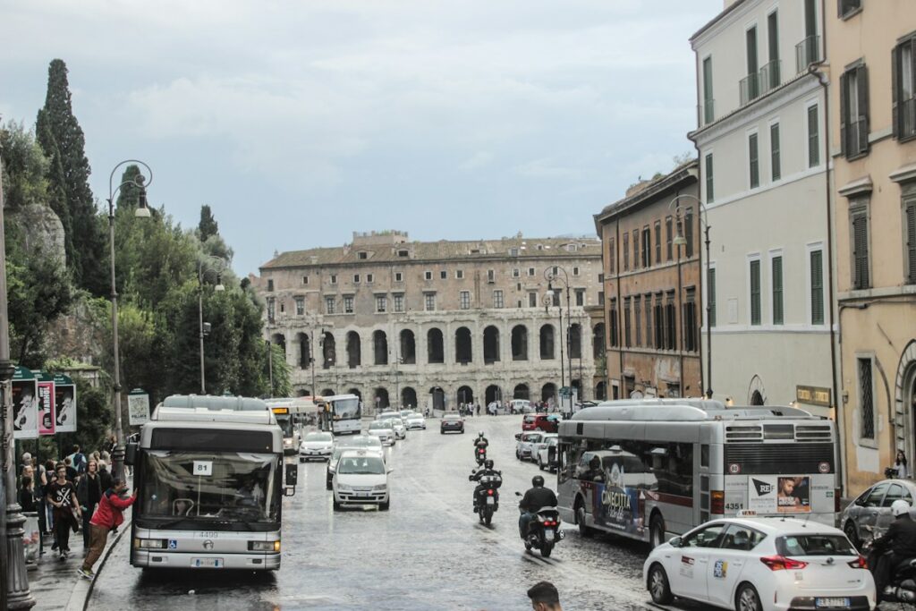 Traffic on a street in central Rome, where a taxi from Fiumicino to Rome ends