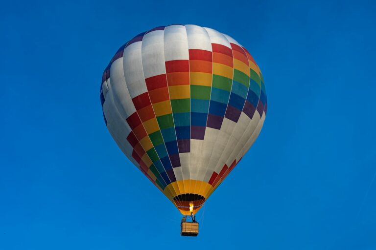 Colorful hot air balloon in a clear blue sky
