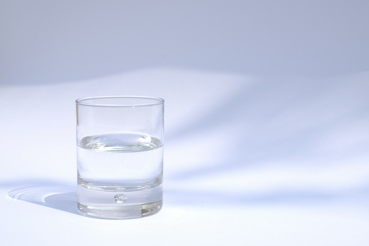 A glass of Italian mineral water on a table