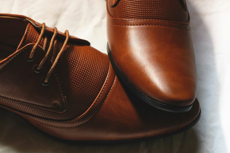 Close-up of polished leather dress shoes, the specialty of Italian shoe brands