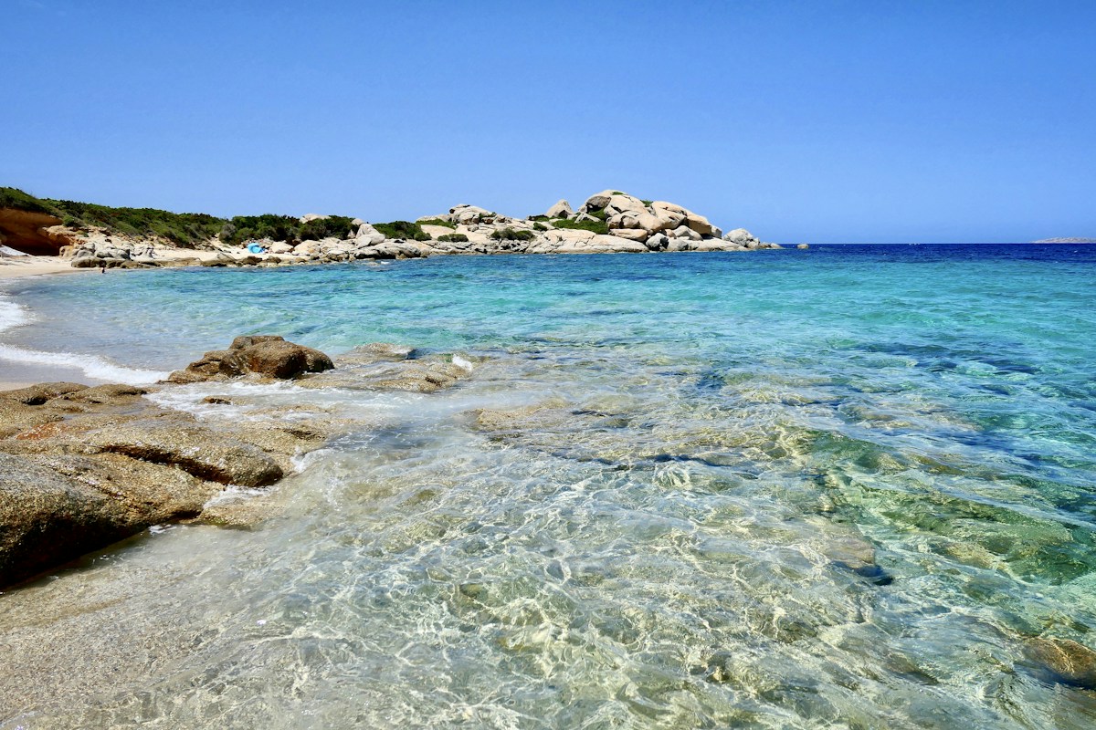 Clear blue water in Sardinia, a peak-season escape for Italy in August