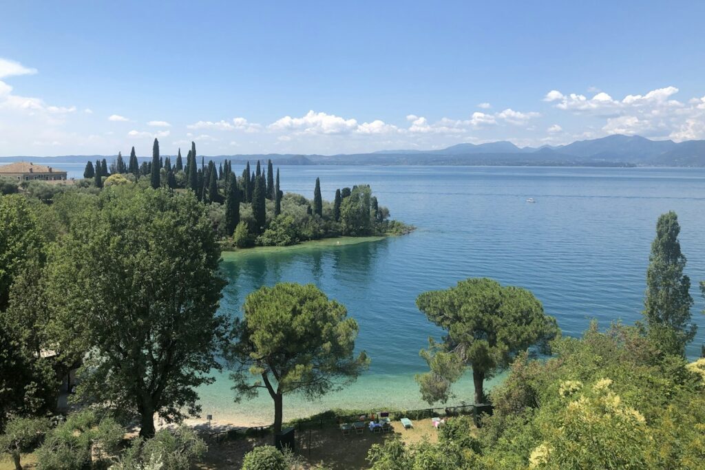 Green shoreline on Lake Garda, a cooler choice for Italy in June