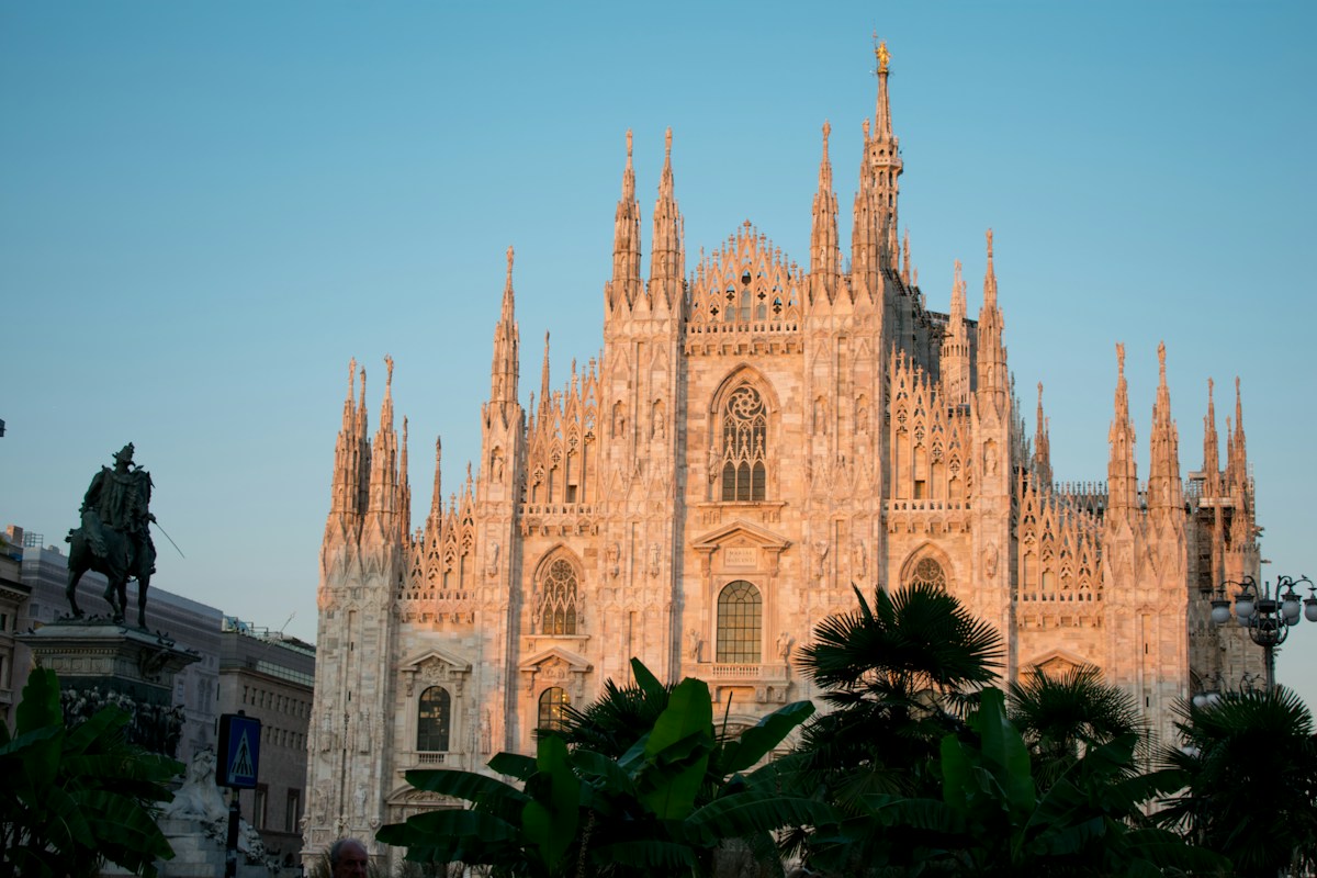 Milan Cathedral under a blue sky, the first stop on a Milan itinerary