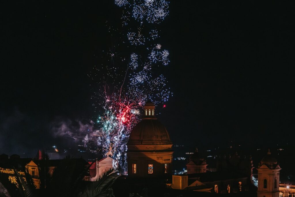 New Year's Eve in Italy: fireworks over the cathedral square in Noto, Sicily