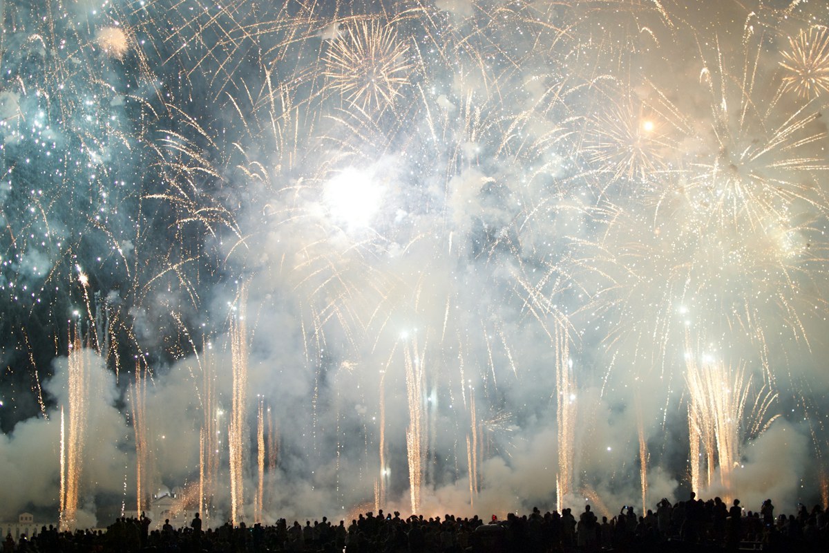 New Year's Eve in Italy: crowds watching fireworks in Venice