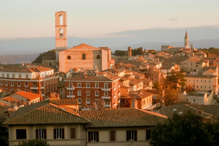 Rooftops and bell tower of Perugia in warm evening light