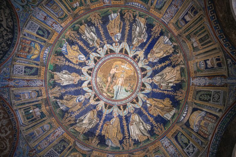 Blue and gold mosaic inside a small dome in Ravenna