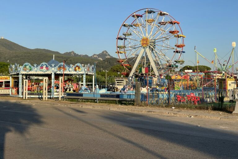 Ferris wheel at a seaside funfair in Lazio, a small-scale taste of theme parks in Italy