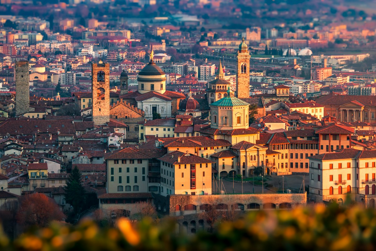 Things to do in Bergamo: Città Alta rooftops and towers at golden hour