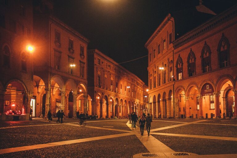 Things to do in Bologna: the porticoes lit up at night