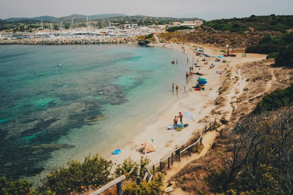 People walking on the shore, one of the easy things to do in Cagliari