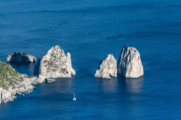 Things to do in Capri: the Faraglioni rocks rising from the sea