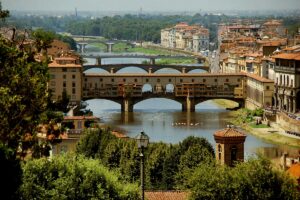 Things to do in Florence: the Ponte Vecchio over the Arno seen from the hills