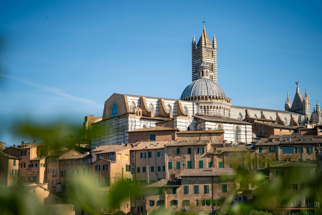The dome and bell tower of Siena Cathedral, one of the top things to do in Siena