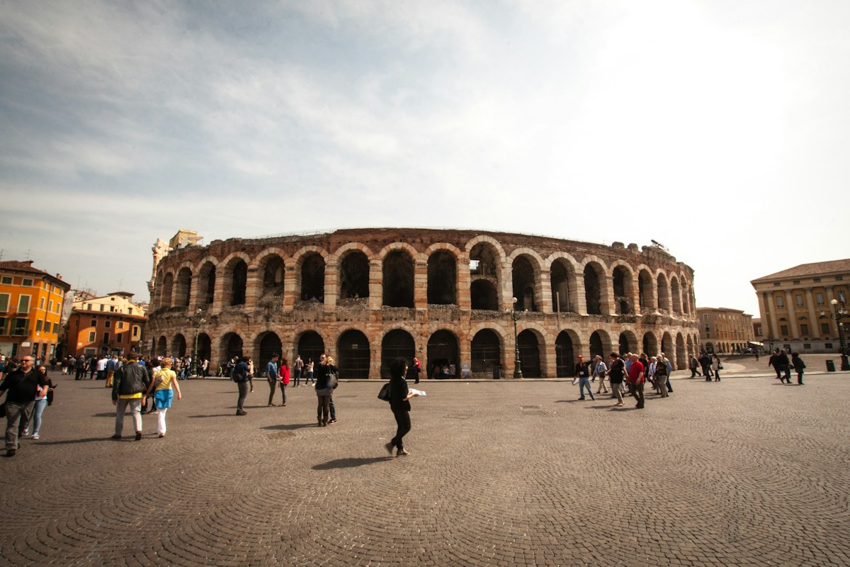 Visitors outside the Arena di Verona, the start of a Verona itinerary