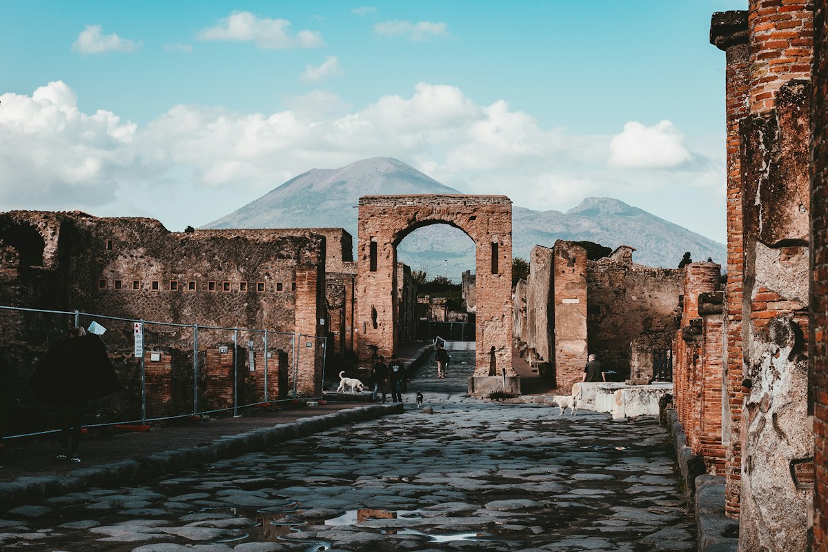 The Forum of Pompeii with Vesuvius behind it
