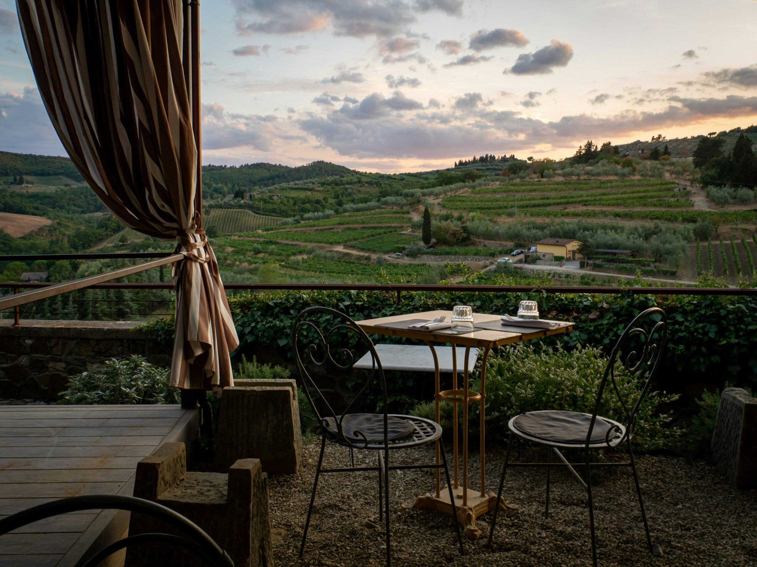 Terrace overlooking the Italian countryside for a Slowxury travel experience