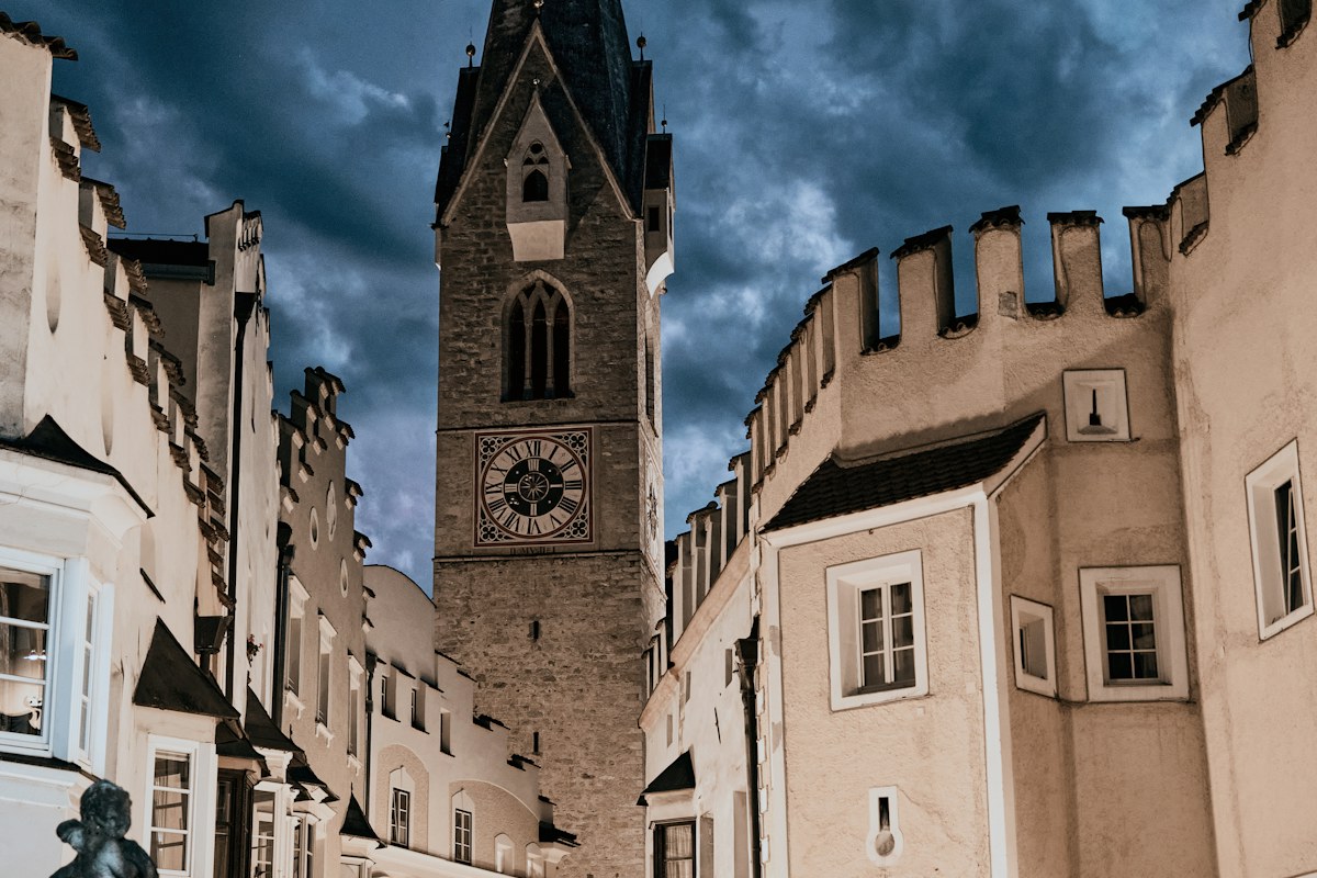 Church tower in the old town of Bressanone, where the Christmas market takes over Piazza Duomo