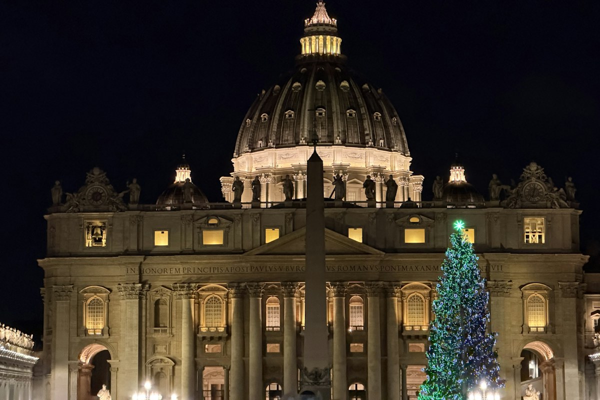 St. Peter's Basilica at night during the Christmas season