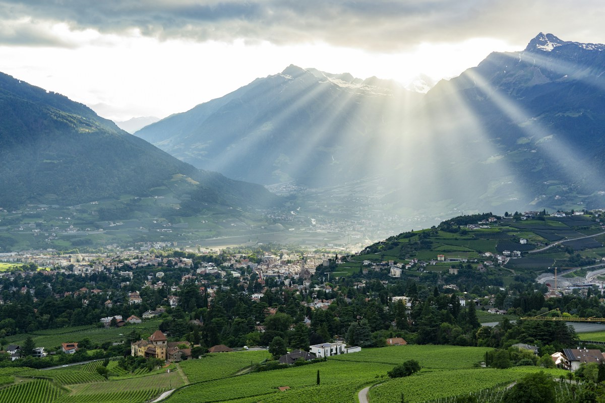 Sun rays over Merano, the spa town that hosts the Merano Christmas market